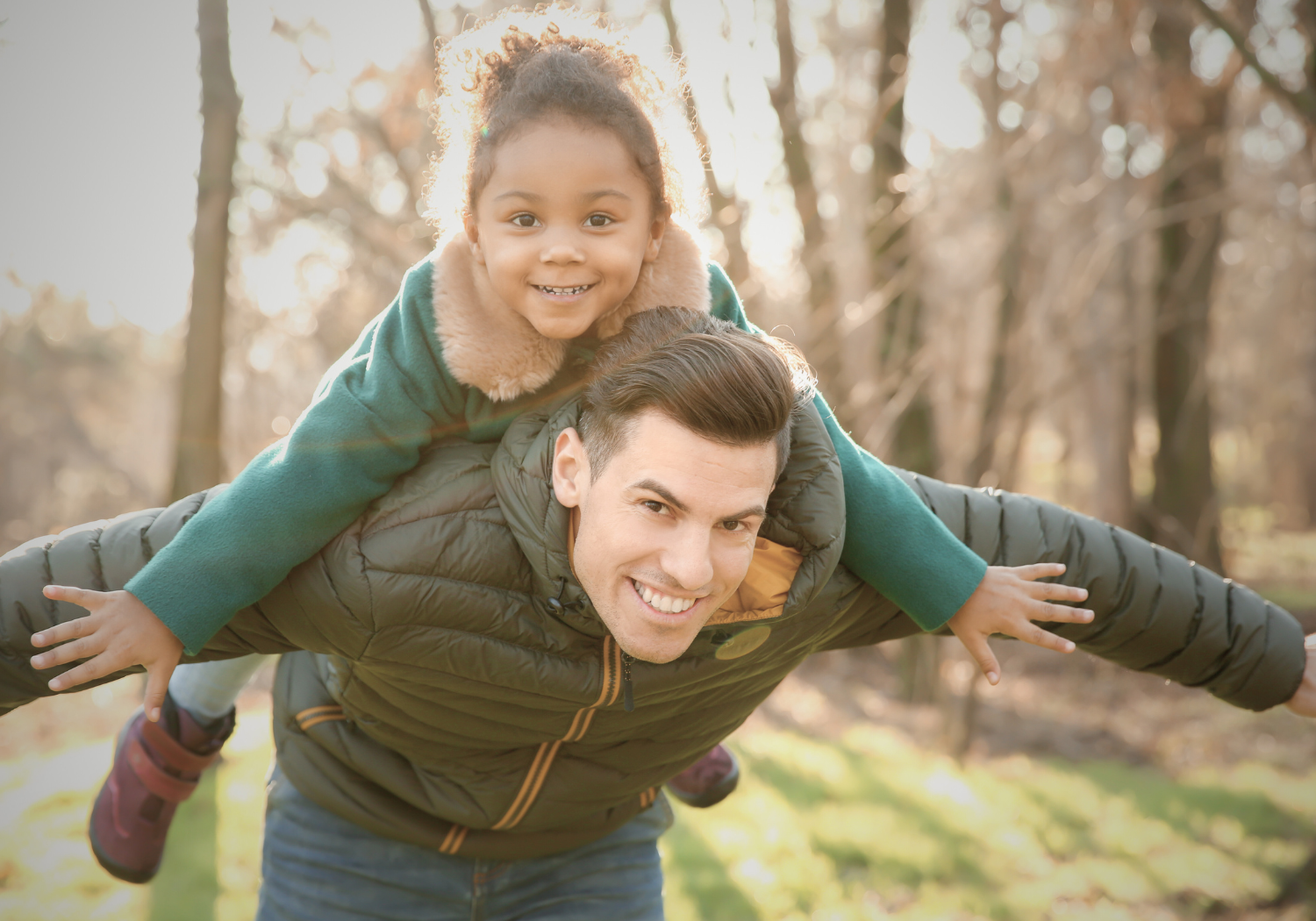 Dad with daughter smiling